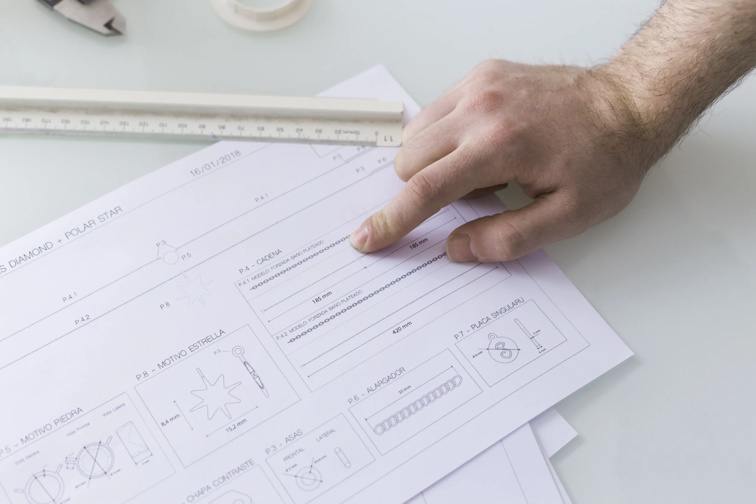 Professional translator reviewing technical documents for accuracy and compliance