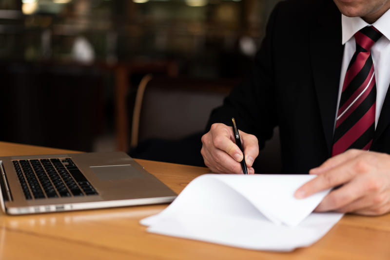 Professional transcription works meticulously on legal documents.