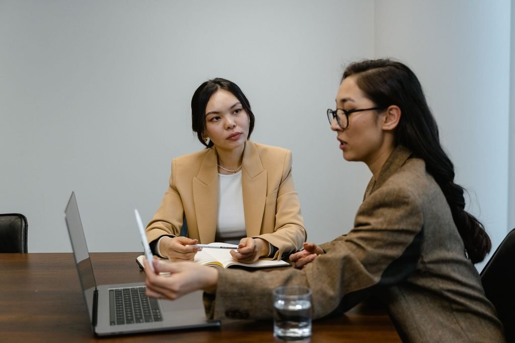  Two professionals planning patent translation for Indonesia’s one-month filing rule.